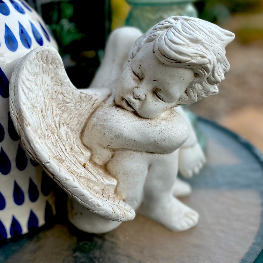 Sleeping Cherub Angel Garden Statue. Nine inches tall about 8” wide.
#AZ-101